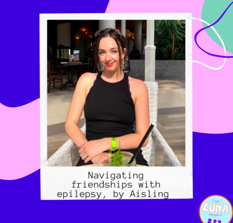 Aisling is sat outside, and is smiling. This image is in a Polaroid style border, and the white section underneath the image has the text “Navigating friendships with epilepsy, by Aisling” on it. This “Polaroid” is on top of big funky purple, blue, and pink shapes